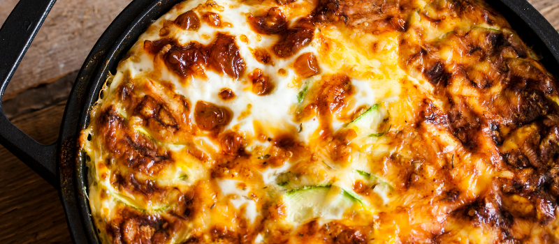 Winterse ovenschotel: smaaksensatie met courgette, paprika en kaas!